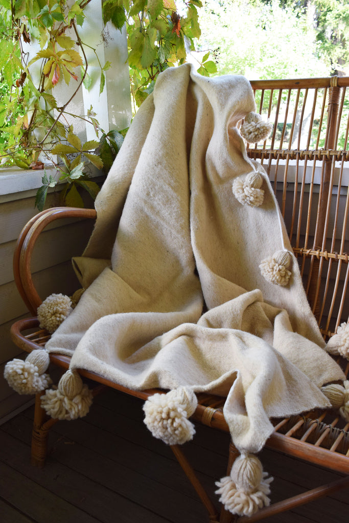 Moroccan Pom Pom Blankets | Worldwide Textiles